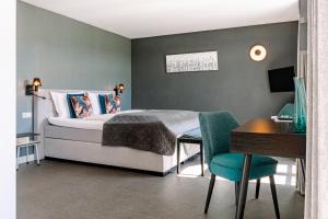Postel nebo postele na pokoji v ubytování B&B Brasserie Villare