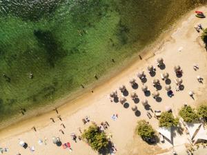 an overhead view of a beach with a group of people at Play Paros in Kampos Paros