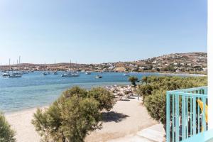 a view of a beach with boats in the water at Play Paros in Kampos Paros