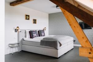 Postel nebo postele na pokoji v ubytování B&B Brasserie Villare