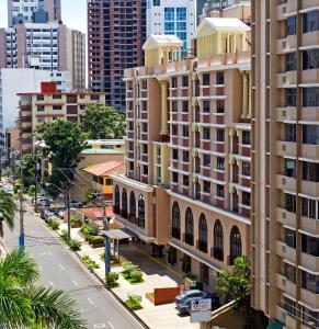 an aerial view of a city with tall buildings at Hotel Milan Panama in Panama City