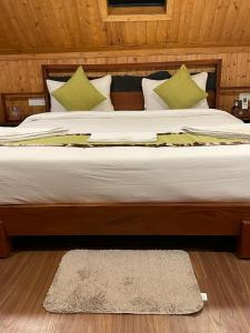 Postel nebo postele na pokoji v ubytování Hotel Sonar Bangla Taki