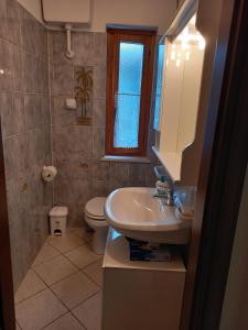 Ванна кімната в Alle porte del Palar