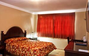 Cama ou camas em um quarto em Hotel Milan Panama
