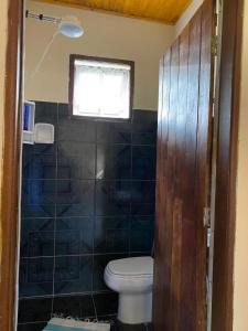 Bathroom sa Casa Aconchegante na Roça - Roseli