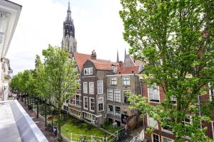 Nespecifikovaný výhled na destinaci Delft nebo výhled na město při pohledu z apartmánu