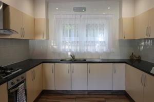Kuchyň nebo kuchyňský kout v ubytování Residence Argine