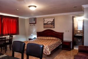 Cama ou camas em um quarto em Hotel Milan Panama