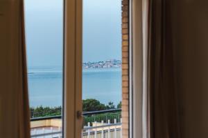 a view of the ocean from a window at La Vista Formia B&B in Formia