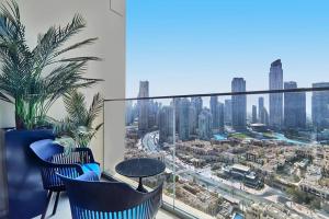 Nespecifikovaný výhled na destinaci Dubaj nebo výhled na město při pohledu z apartmánu