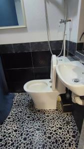 Een badkamer bij Tsim Sha Tsui Bedrooms