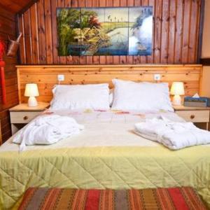 Ένα ή περισσότερα κρεβάτια σε δωμάτιο στο אירוח אביטן בפסגת הנוף