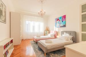 Posteľ alebo postele v izbe v ubytovaní Centar Park Apartment
