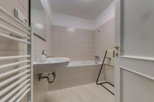 Ванная комната в Vita Nejedleho apartments