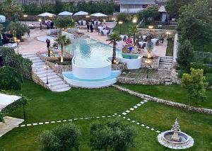 an image of a fountain in a park at Hotel Colaiaco in Anagni