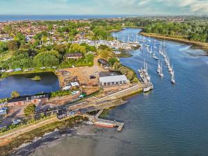 an aerial view of a marina with boats in the water at Selsmore Cottages in South Hayling