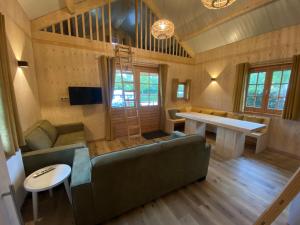 TV a/nebo společenská místnost v ubytování Camping de Uitwijk