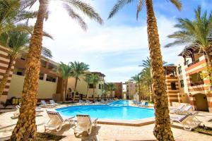 The swimming pool at or close to Marina Residence Suites Port Ghalib