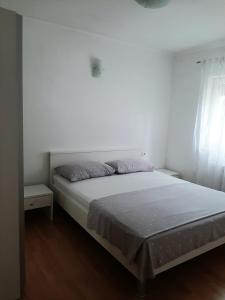 Postel nebo postele na pokoji v ubytování Apartment Mariana