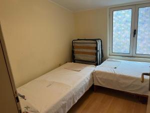 Postel nebo postele na pokoji v ubytování Stella Petrovac