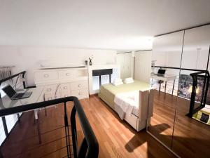 Ein Bett oder Betten in einem Zimmer der Unterkunft HSL apartments - Settembrini 7