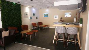 Телевизор и/или развлекательный центр в Hotel Laitau