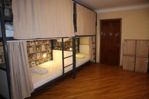 Letto o letti in una camera di Sweet Sleep hostel