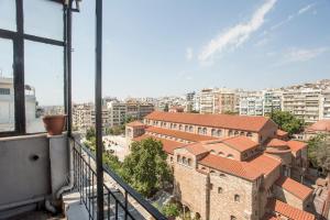 a view of a city from the balcony of a building at Closer "Penthouse Apartment 1" in Thessaloniki