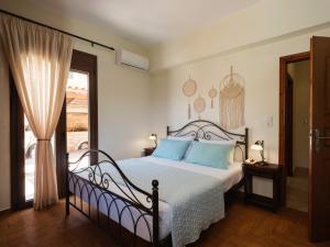 Posteľ alebo postele v izbe v ubytovaní Ageri Traditional Villa