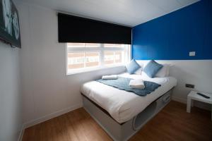 Postel nebo postele na pokoji v ubytování CiTi Hotel London Luton