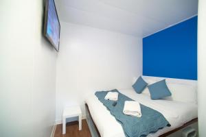 Postel nebo postele na pokoji v ubytování CiTi Hotel London Luton
