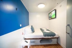 TV a/nebo společenská místnost v ubytování CiTi Hotel London Luton