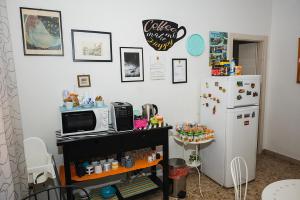 Kuchyň nebo kuchyňský kout v ubytování B&B Pisaland