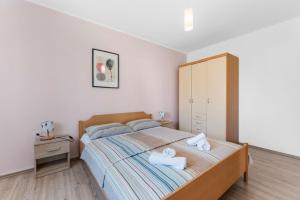 Giường trong phòng chung tại Casa Ninetta +27 ảnh