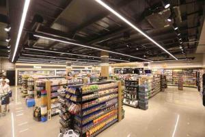a grocery store aisle with a lot of products at Swanlake North Coast Luxury Villa in Zāwiyat al ‘Awwāmah