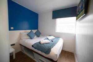 Postel nebo postele na pokoji v ubytování CiTi Hotel London Luton