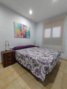 A bed or beds in a room at Ca la Mercè