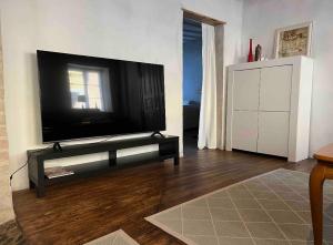 TV o dispositivi per l'intrattenimento presso Apartments in the center of Ystad