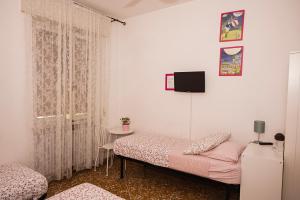 Postel nebo postele na pokoji v ubytování B&B Pisaland