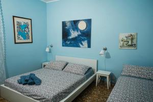 Postel nebo postele na pokoji v ubytování B&B Pisaland