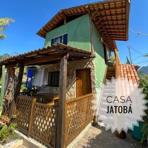 a villa with a view of the house at Casa espaçosa famíliar in Paraty
