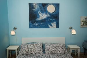 Postel nebo postele na pokoji v ubytování B&B Pisaland