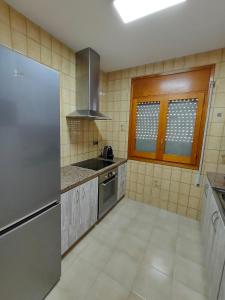 A kitchen or kitchenette at Ca la Mercè
