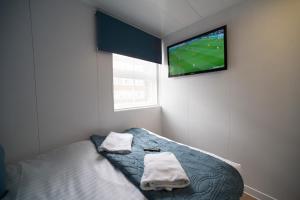 Postel nebo postele na pokoji v ubytování CiTi Hotel London Luton