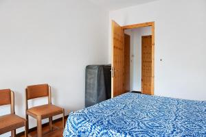 Postel nebo postele na pokoji v ubytování Green Entracque 1