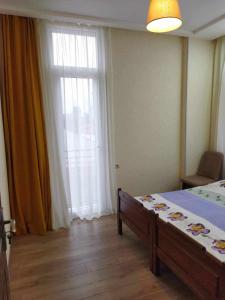 Postel nebo postele na pokoji v ubytování Elmari Home
