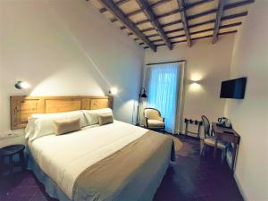 Posteľ alebo postele v izbe v ubytovaní Hotel Casa Miranda - Adults Only