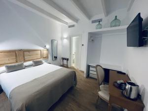 Posteľ alebo postele v izbe v ubytovaní Hotel Casa Miranda - Adults Only