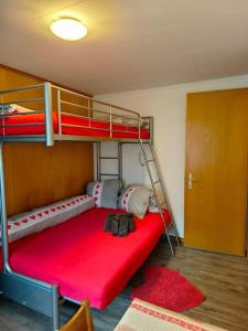 Postel nebo postele na pokoji v ubytování Wohnung Tchiyaka