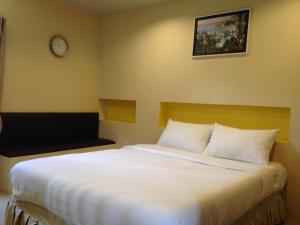 Posteľ alebo postele v izbe v ubytovaní C2 Residence